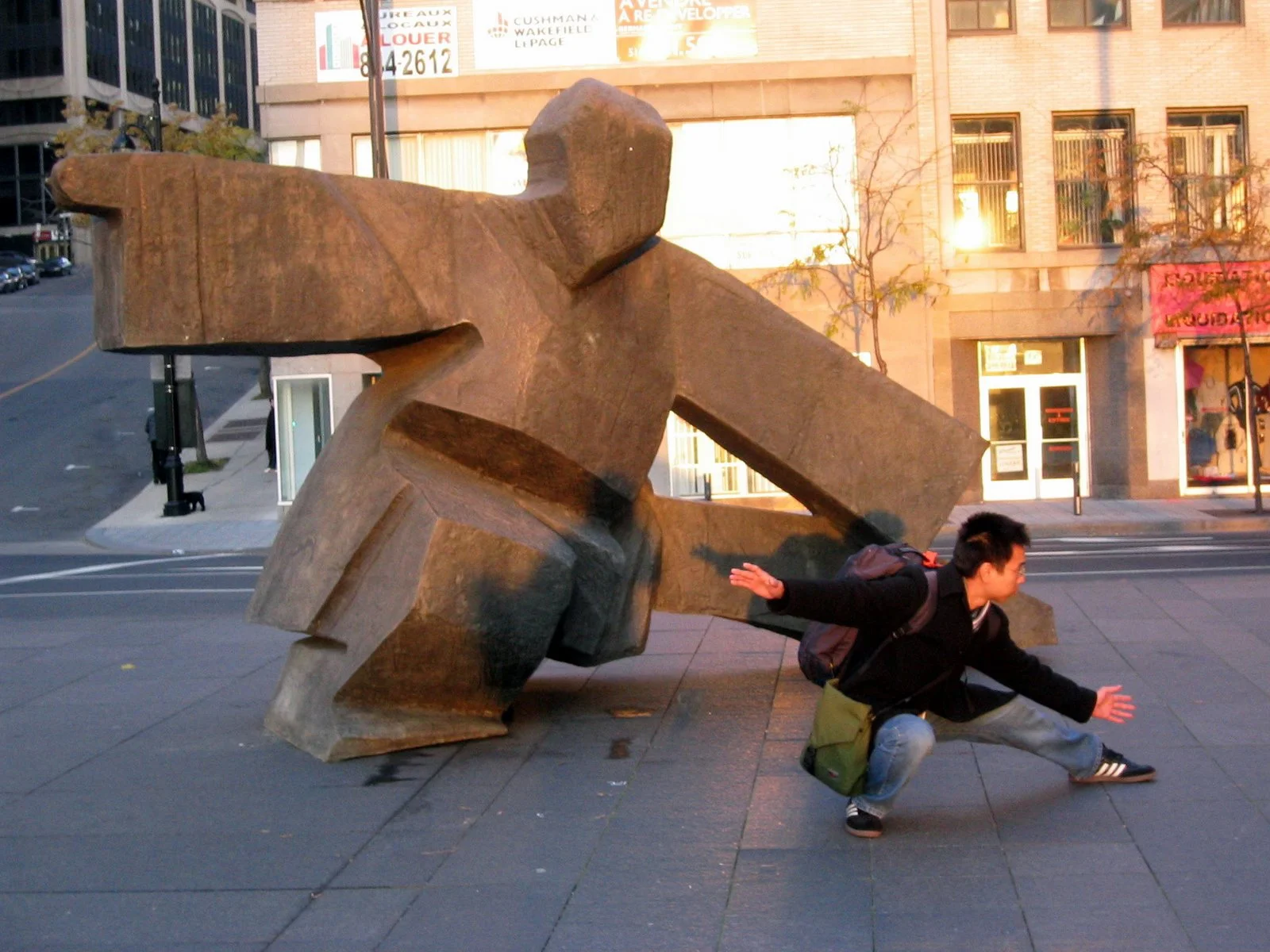 In Montreal they have a giant statue performing Taichi. I'm at the right, life imitating art imitating life.