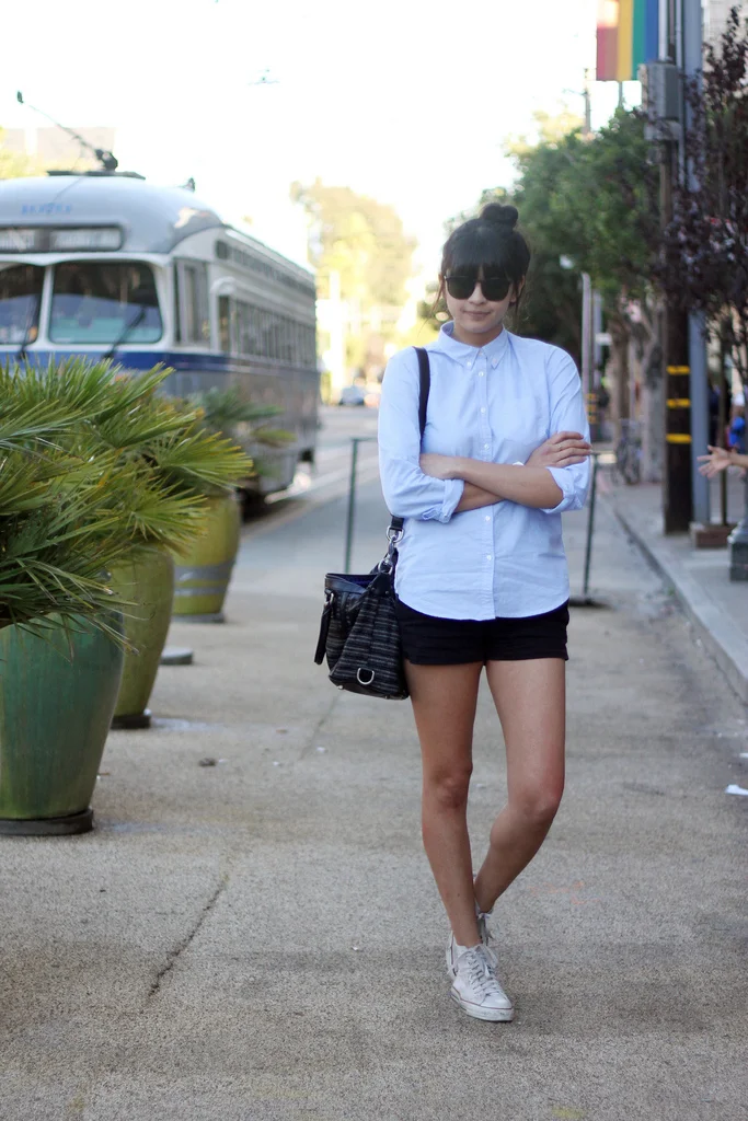 Girl Wearing white High Tops.jpg