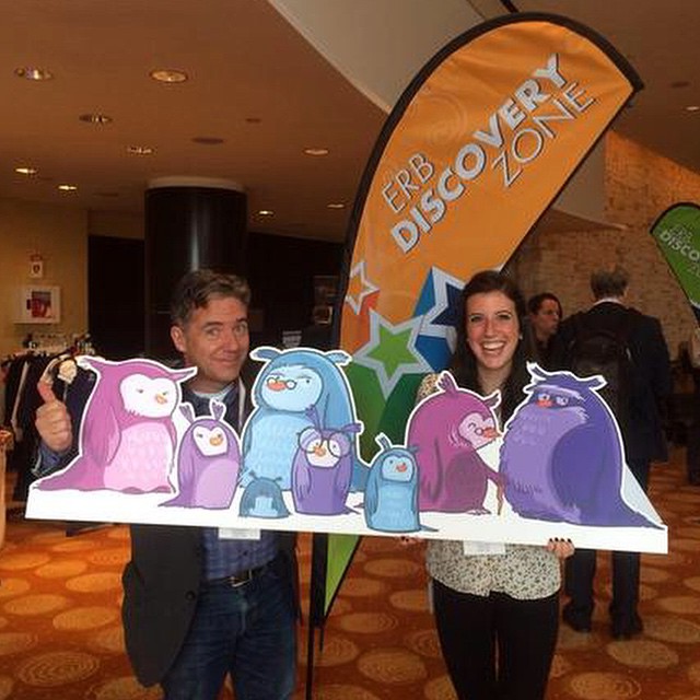Katie with Paul Reynolds, FableVision CEO, at 2014's ERB Annual Conference in Boston. They pose here with some FableVision-created characters that are part of ERB's AABL project.