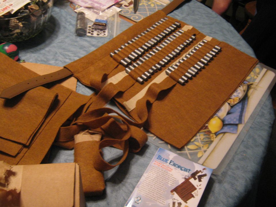 My mémère used her amazing sewing skills to help create my character's bullet belt (as shown on the manga below it).