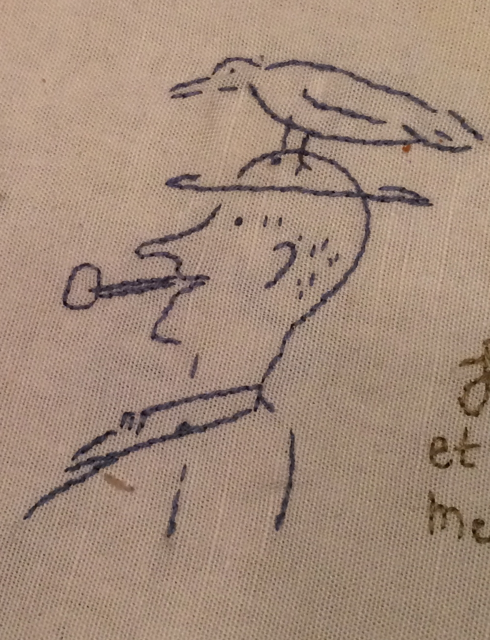 While my dad mostly drew on the beach, he drew this on my sister-in-law's famous tablecloth filled with embroidered signatures of guests.