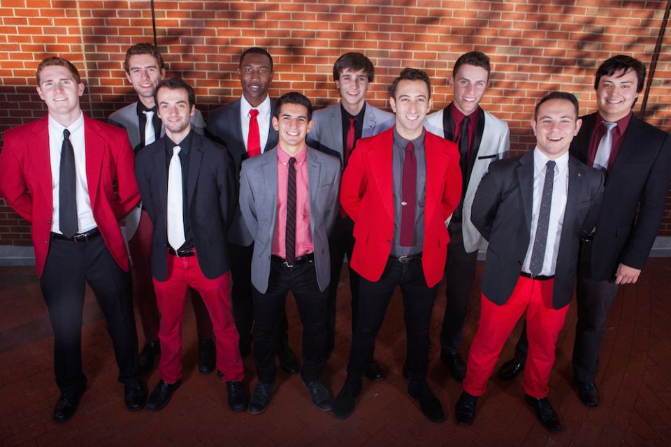 Carl front and center of his acapella group the Beelzebubs