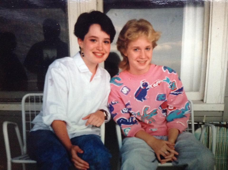 Leigh (pictured on the right) in high school