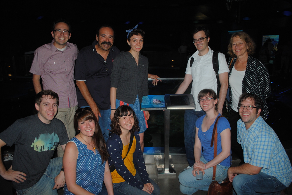 The FableVision team pictured alongside the Giant Ocean Tank's Fish ID App