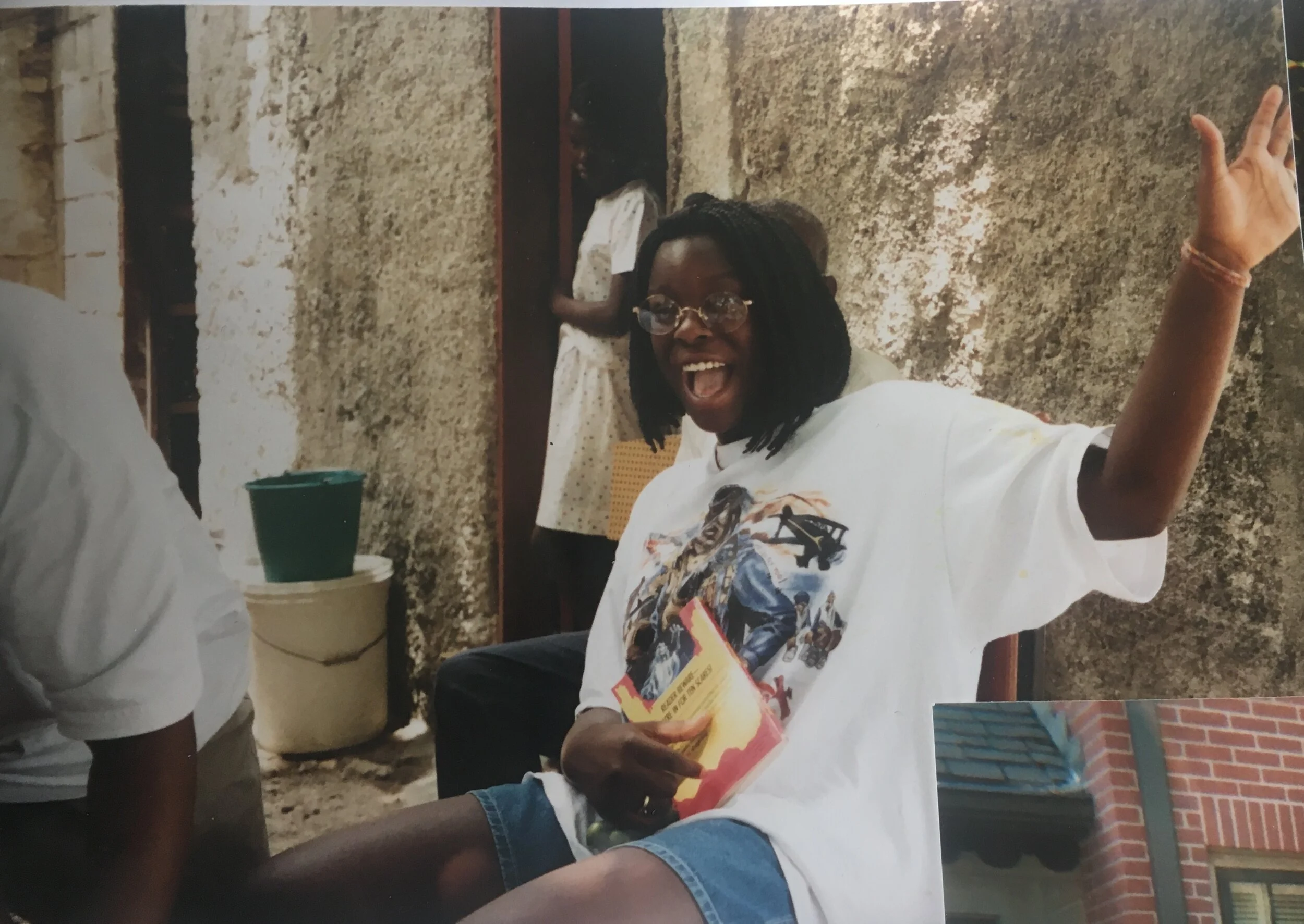 Mia in Haiti in 1996 with a Goosebumps book. She always had a book somewhere on her.