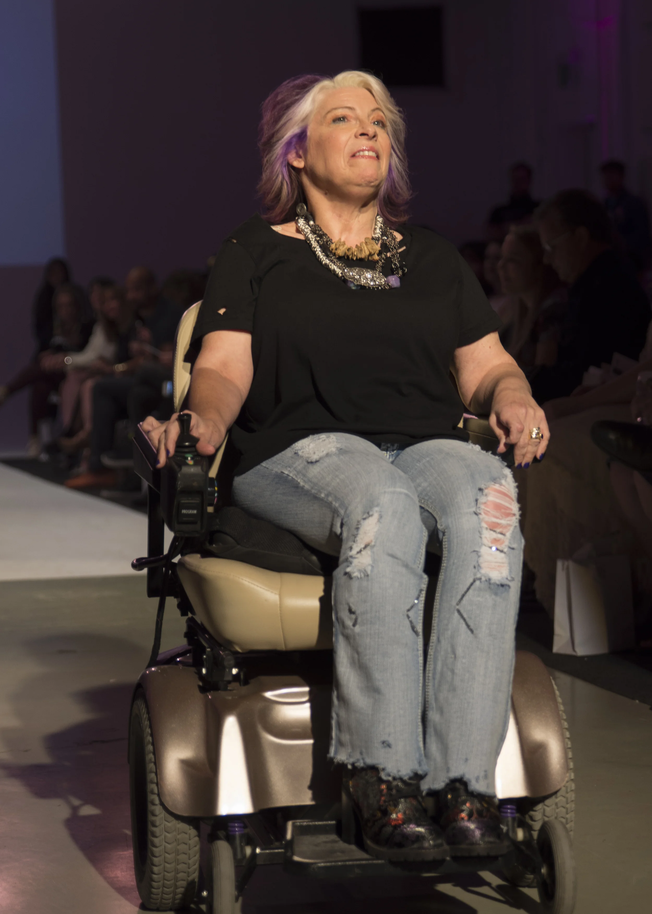 Wearing jewelry by Sue Surdi Designs . Photo by Searcy Studios .