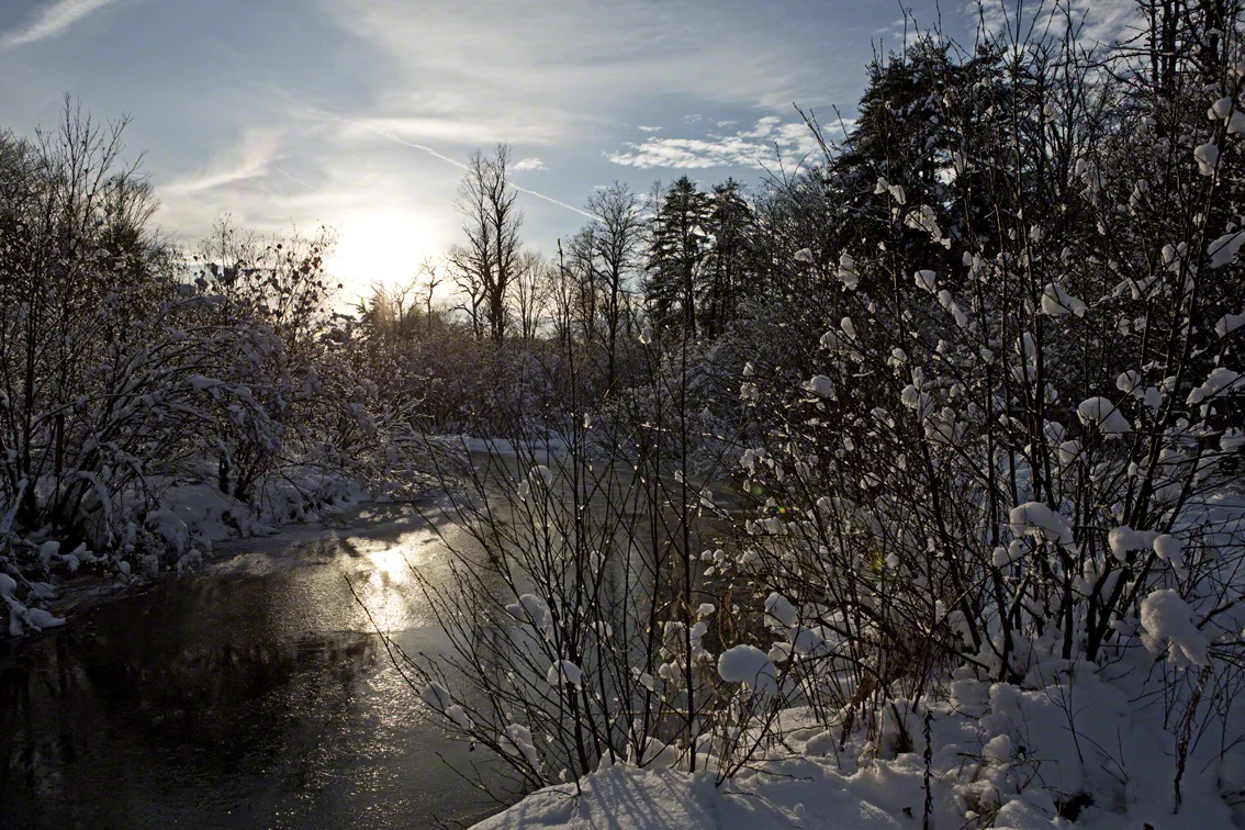 sun setting over tionesta creek
