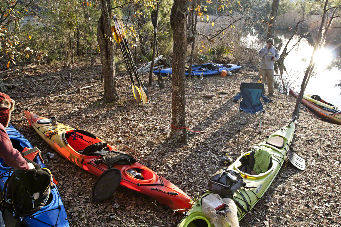 unloading gear at the campsite.