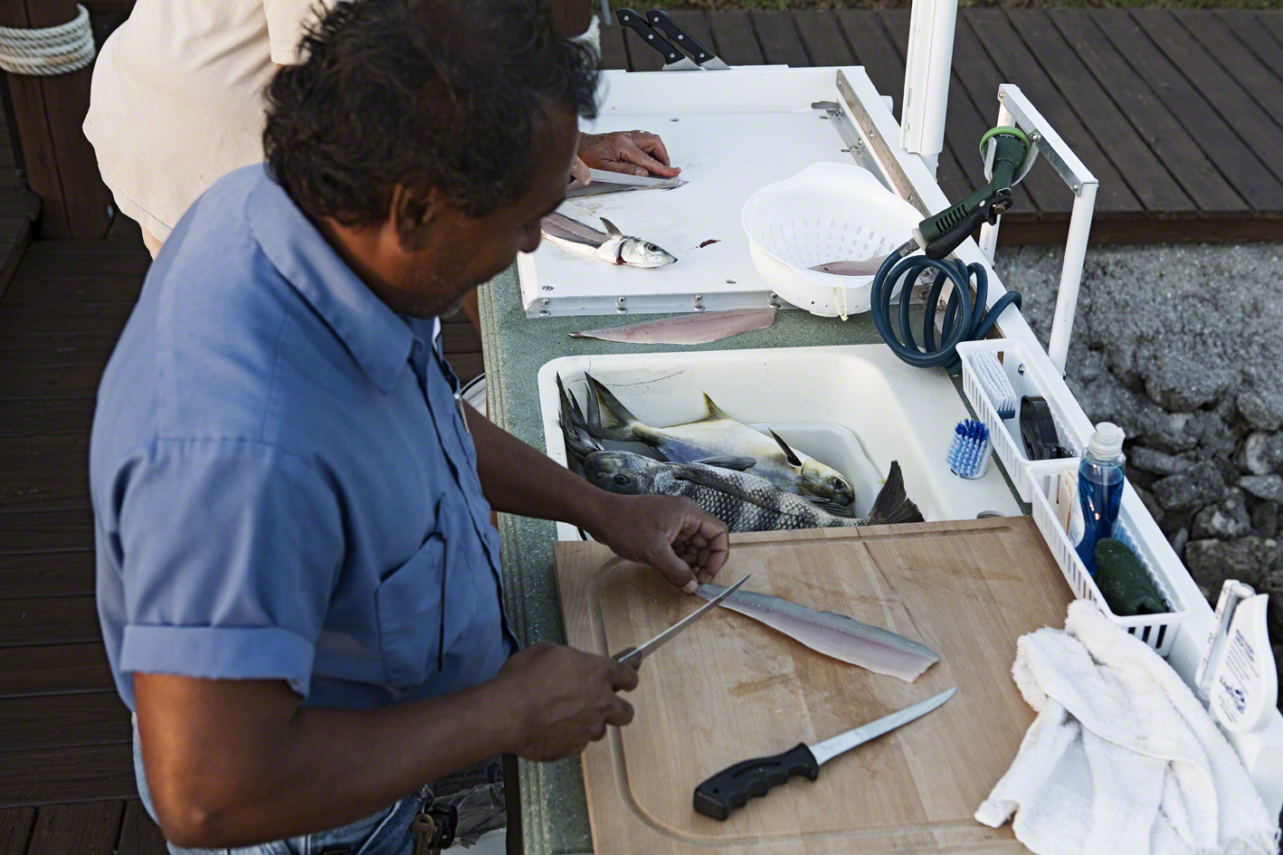 pop and thomas cleaning the days catch