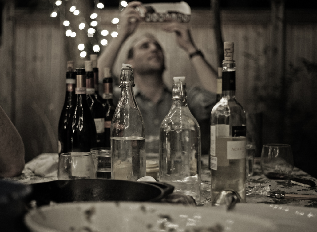 aftermath of the dinner party, mike making sure there is enough sugar in the berger cookies.
