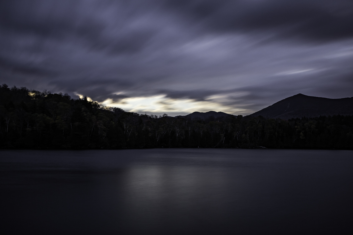 the moon rise over moose pond
