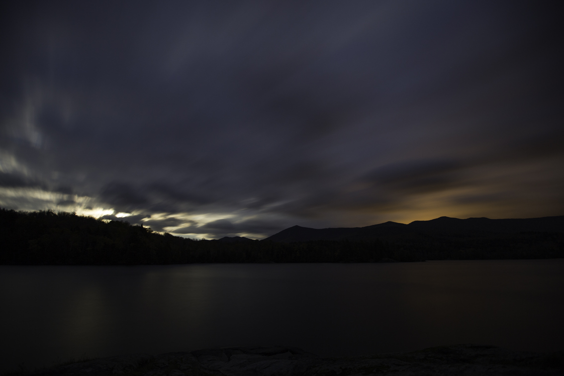 another view of the moon rise - light pollution from lake placid is reflected in the clouds
