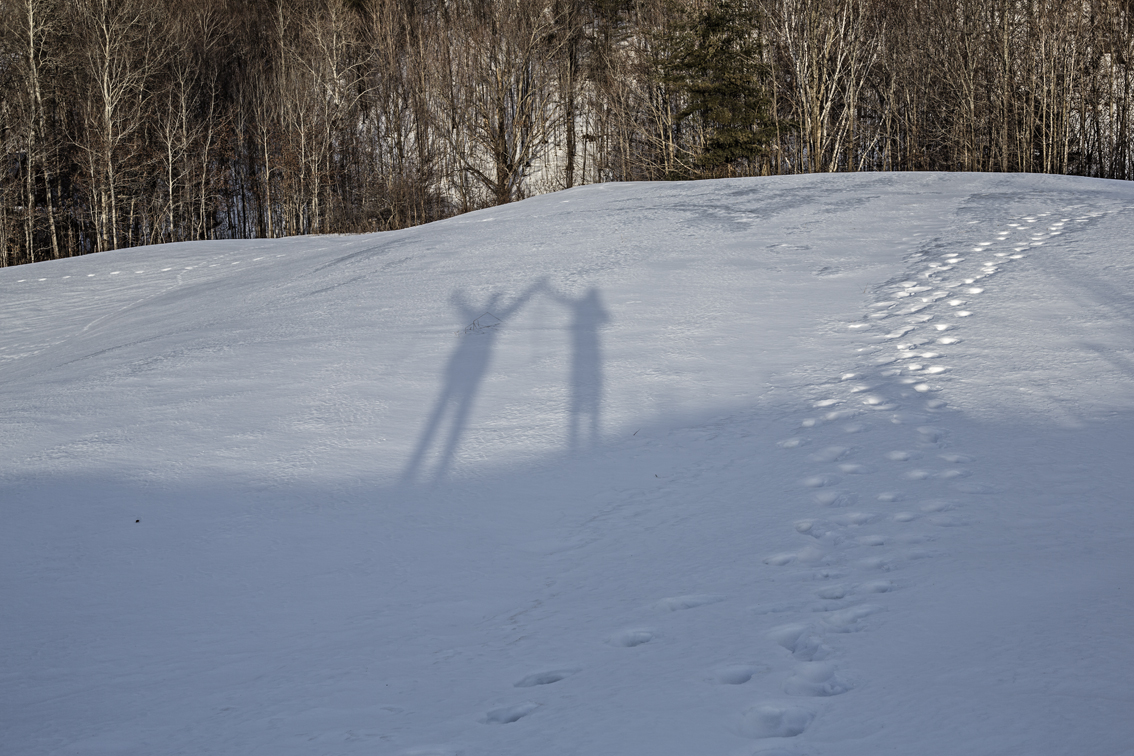 Celebrating the end of a grueling 4.5 miles in ice crusted snow.