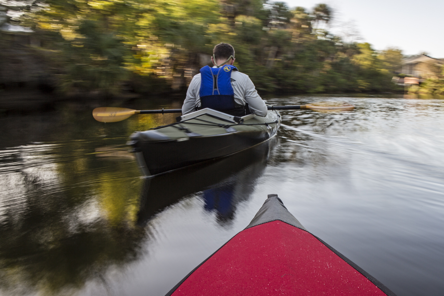 Jim checking into his flight for the next day as we float on Alligator Creek.