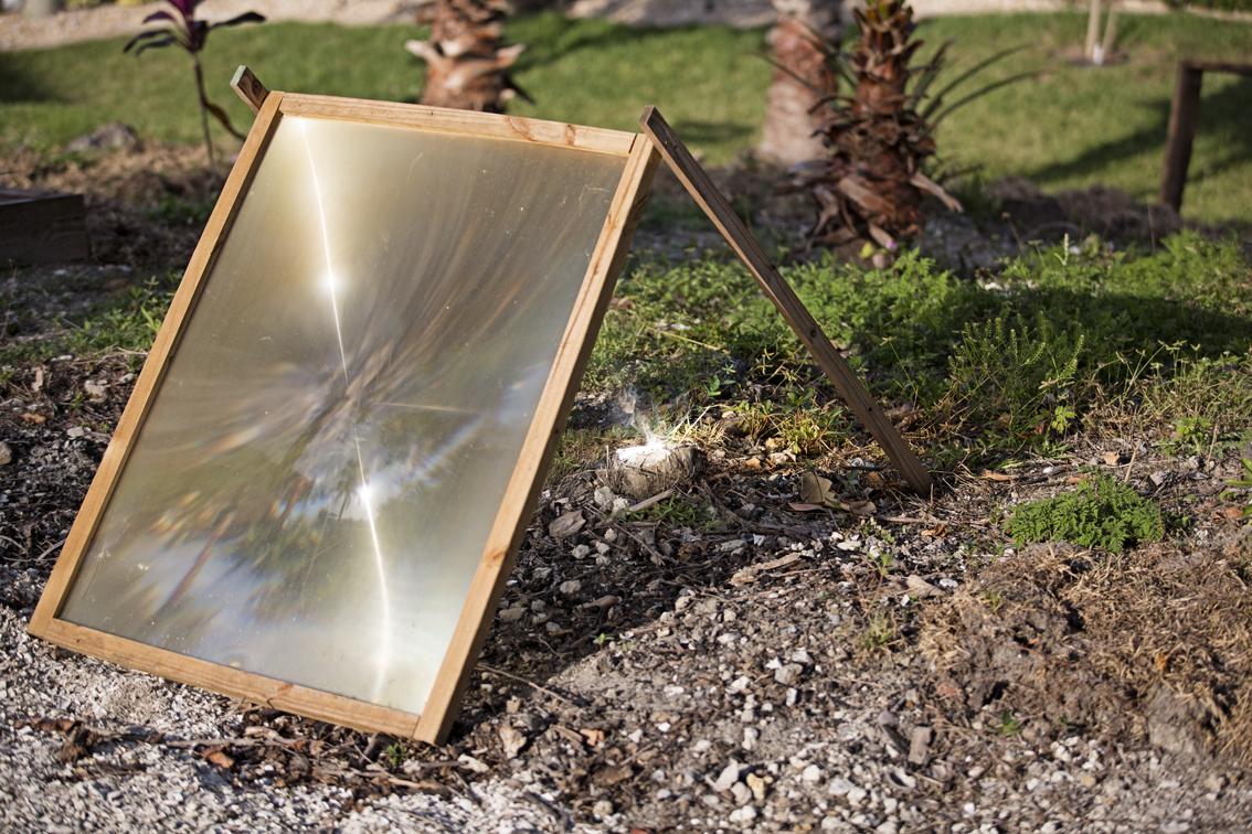 A magnifying glass on steroids. My dad and the neighbor use this to burn stumps out of the ground. It is the front element of an old projection TV, and it is the coolest toy.