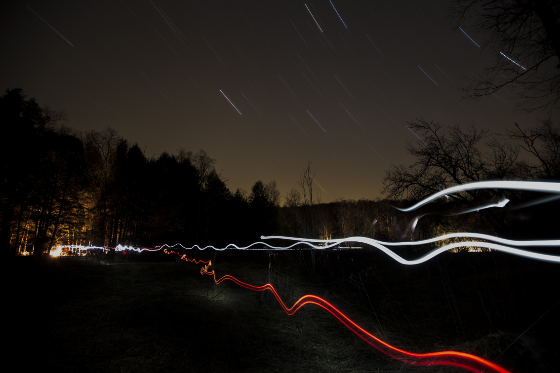 Star trails above the 3 camp sites. To the left, in the pines is where our group stays. The middle, across the creek is the old folks camp, too many of our crew have resolved to staying there..... To the right is the other young folks camp.