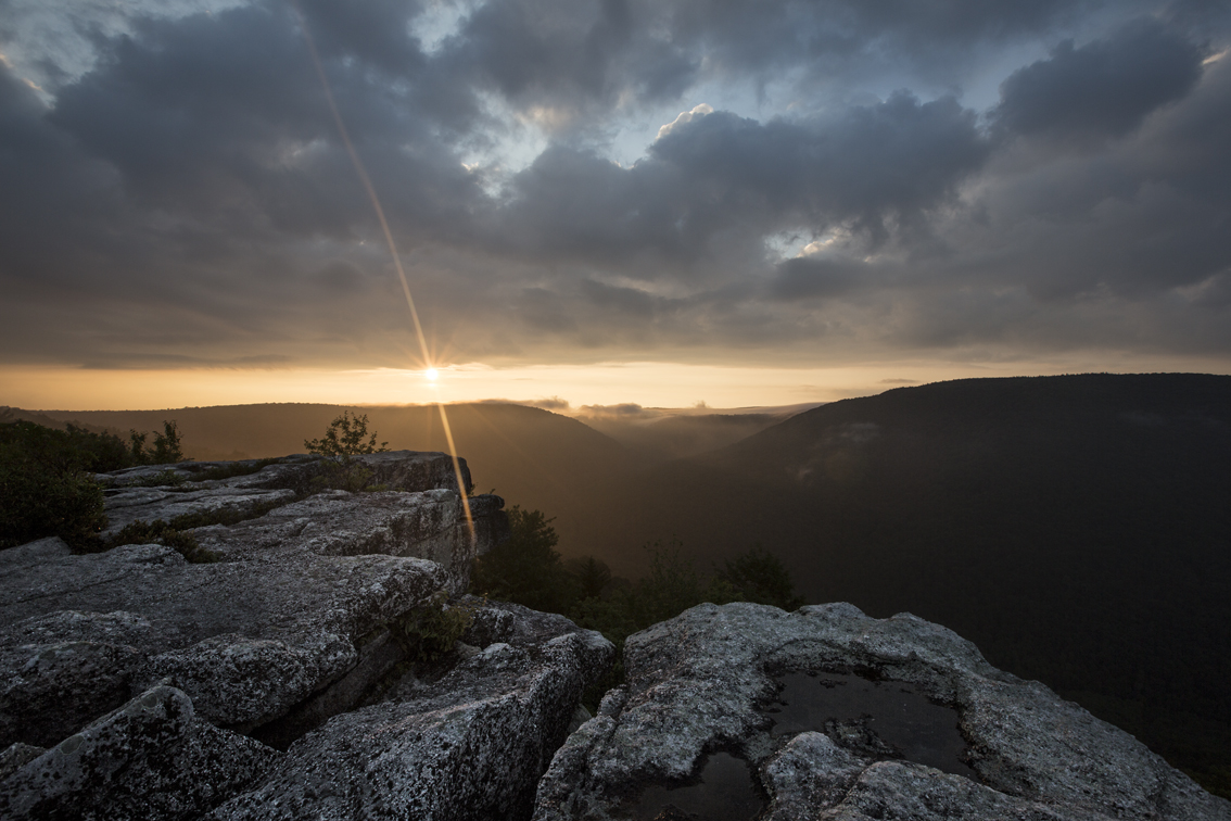 The low layer of clouds and the mountain tops made for the perfect sunrise sandwich.