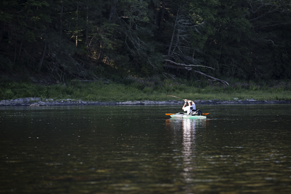 Our campsite neighbor, catching all the fish.