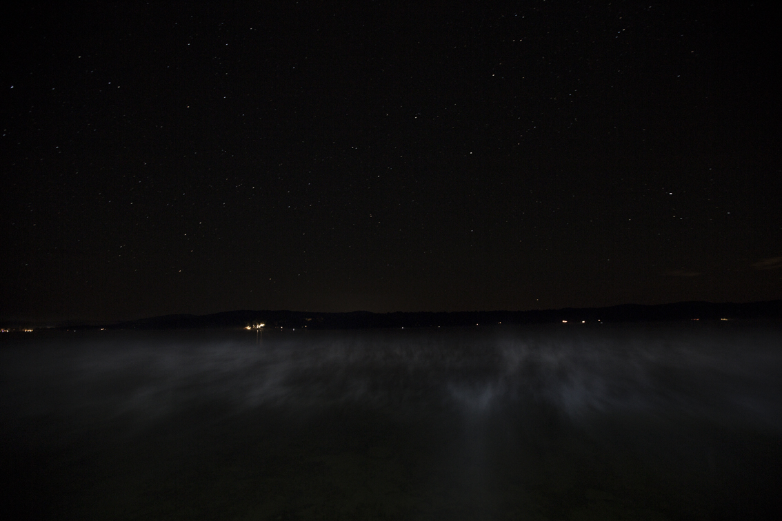 Fog and stars on Fourth Lake in the Adirondacks.