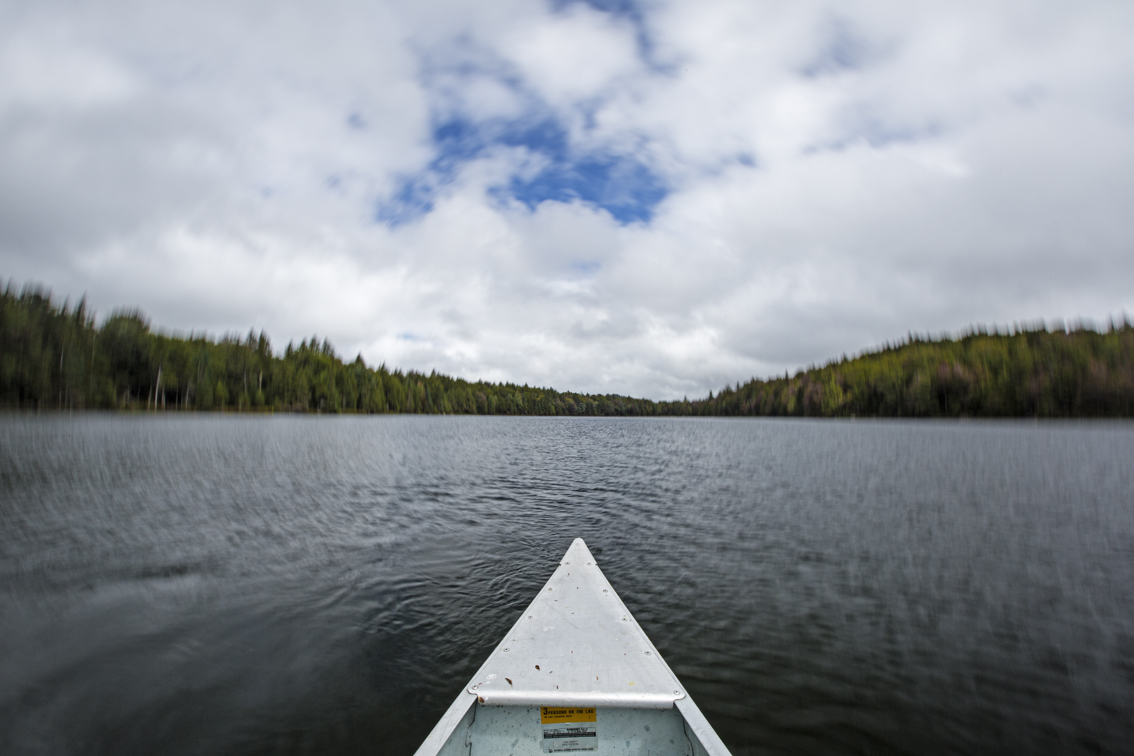 A peak of blue sky on Sis Lake, Inlet, NY.