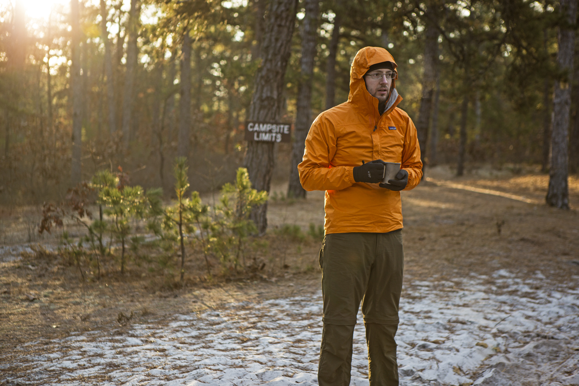 Frank soaking up the first rays of sunshine at the Mullica campsite.