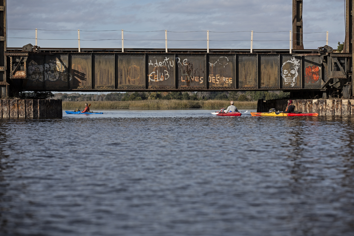 "Adventure Clube Love's Desiree" We didn't write this, and we have no idea who Desiree is. The crew floating under the railroad bridge on the Wallace River.
