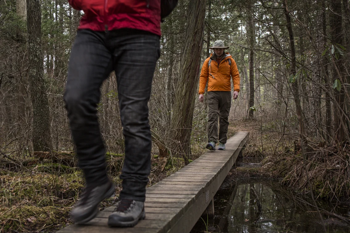 Loren and Frank crossing one of the many boardwalks on the Batona Trail.