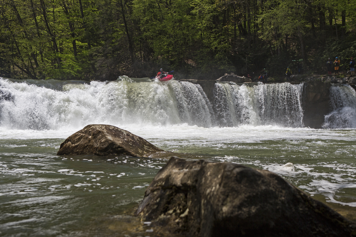 Jim launching off the top of 18 foot Wonder Falls on the LBS, class IV.