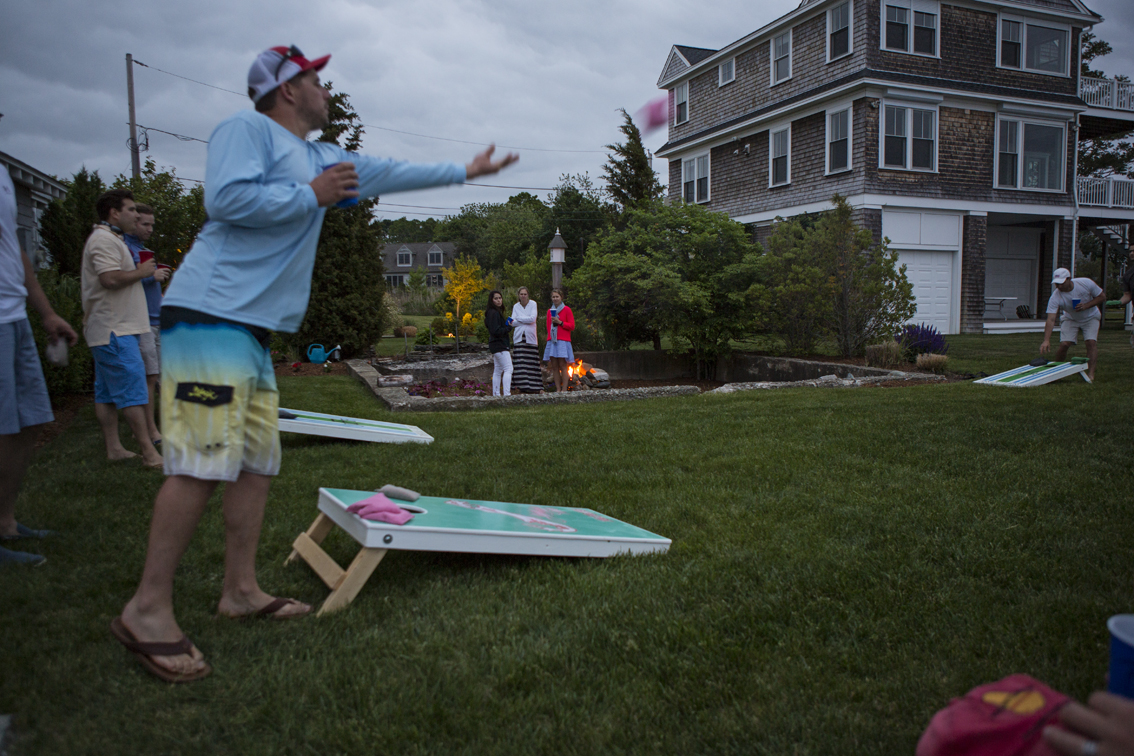 Corn hole, beer and a fire, right by the water - pretty perfect.