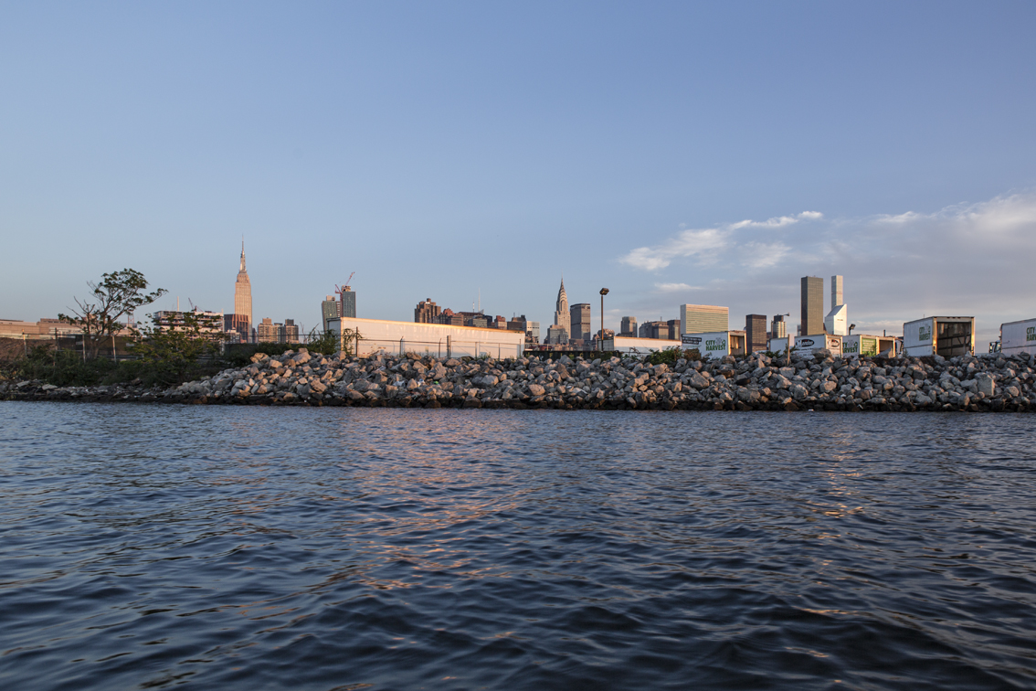 The Empire State building from the water on Newtown Creek.