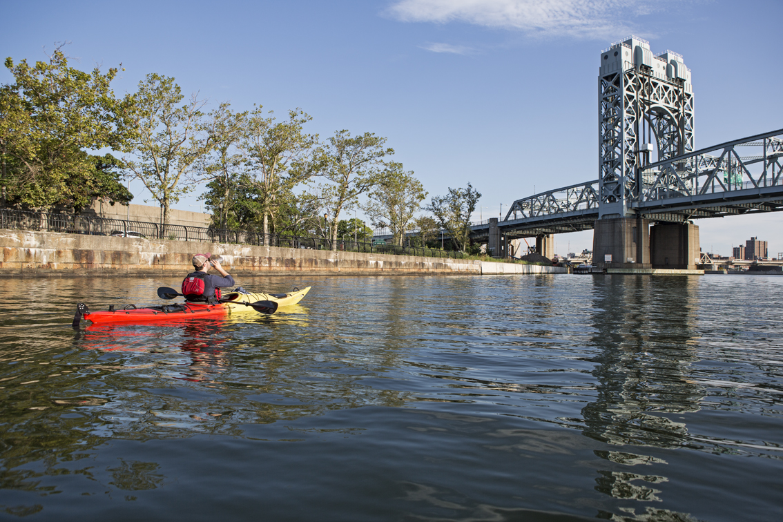 Keeping hydrated, about to pass under the RFK bridge in the Harlem River.