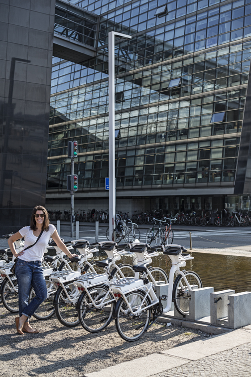 Sloane at one of the bike shares, outside of the national library of Denmark.
