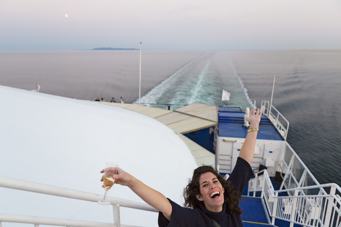 Sloane enjoying the sunset and moonrise on the Crown Seaways. 