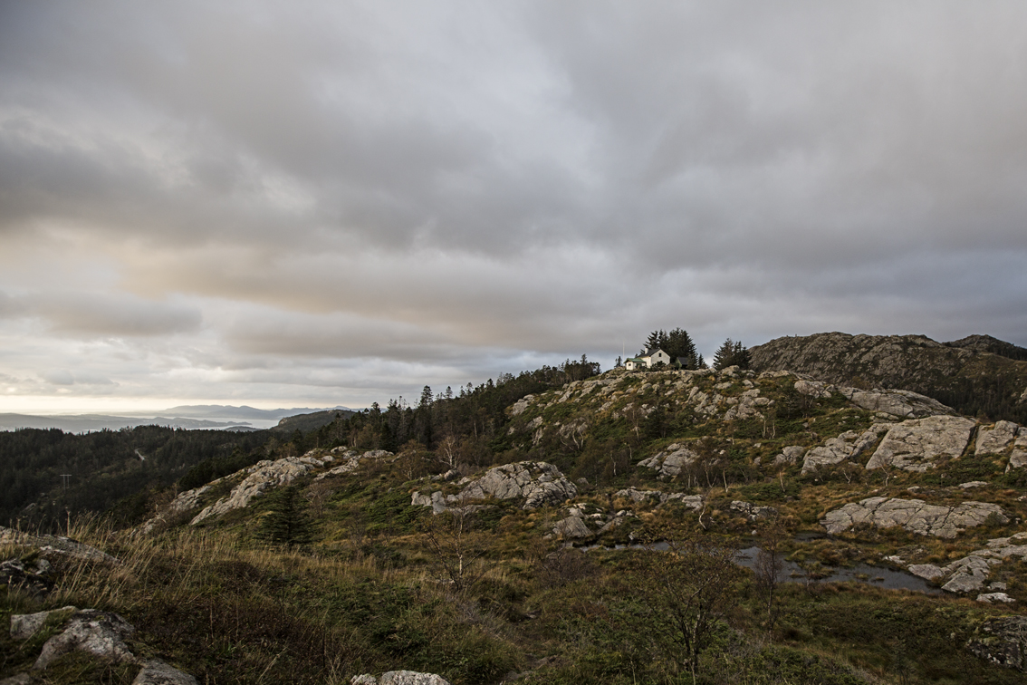 A DNT cabin at the top of Mt. Floyen, the North Sea in the background.