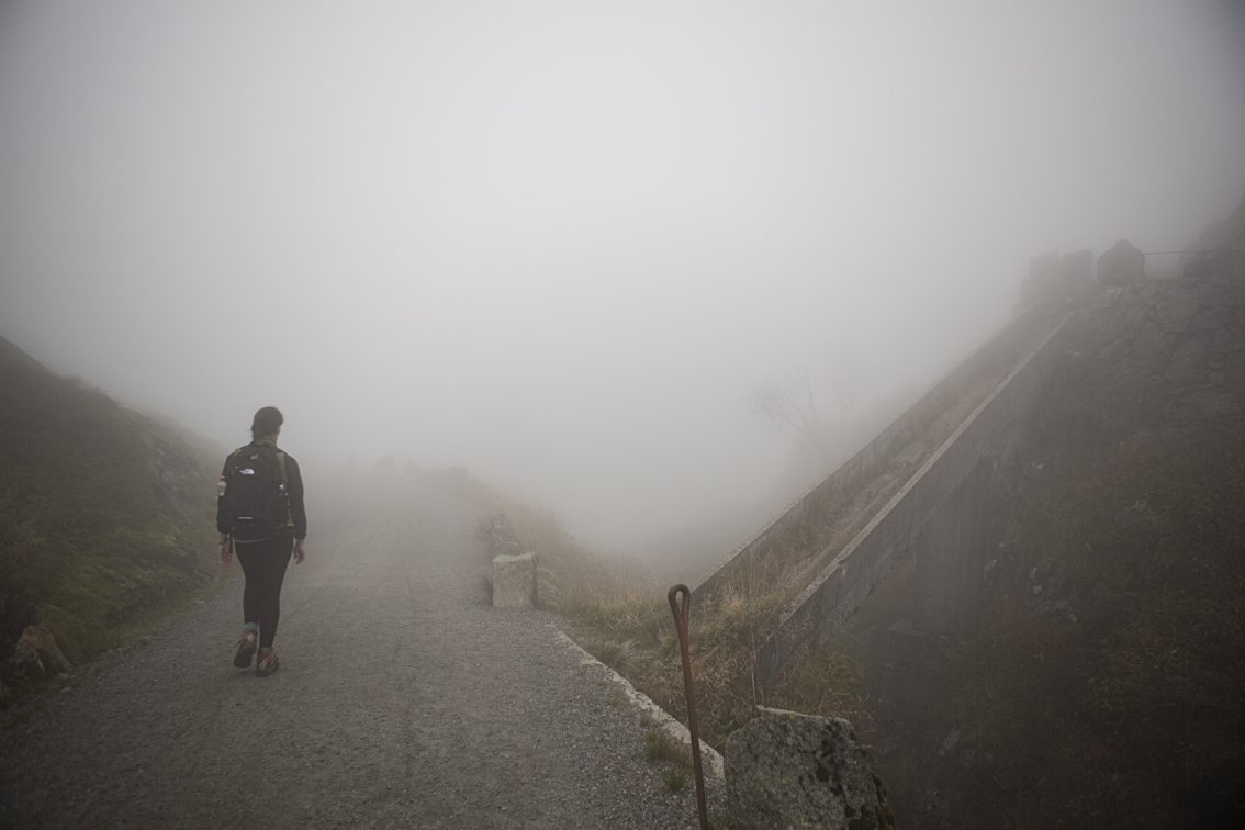 Sloane hiking through the clouds.