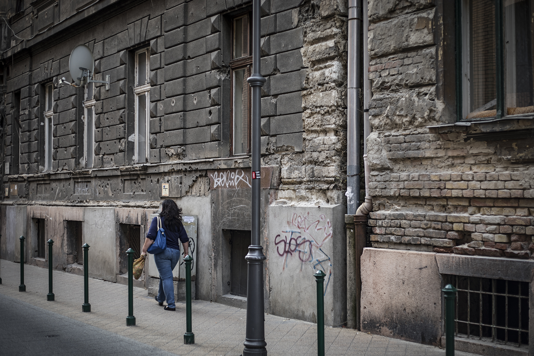 Bullet holes and graffiti - a very different view of Budapest from the tourist areas.