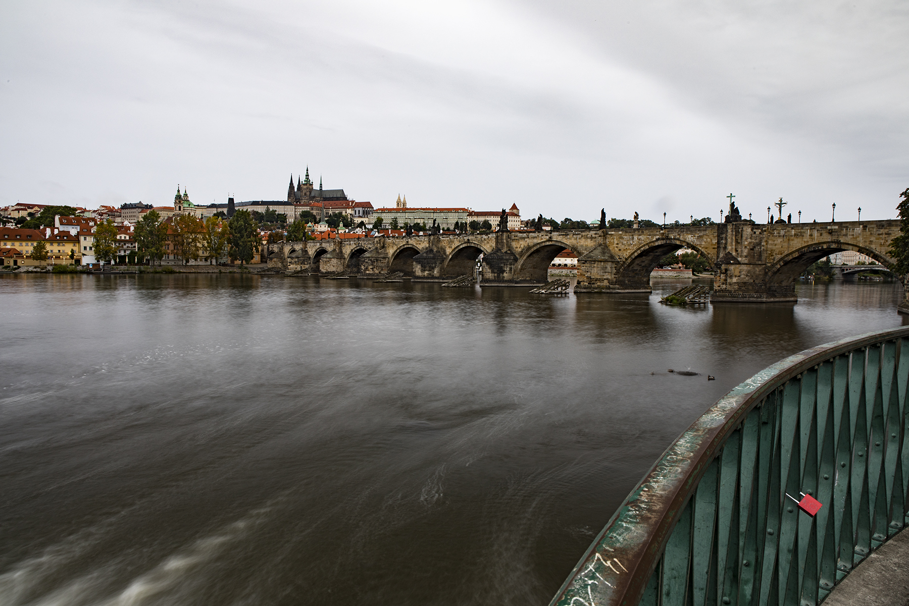 Vltava river and the Charles Bridge. Directly to my right were 20 Asian tourists.