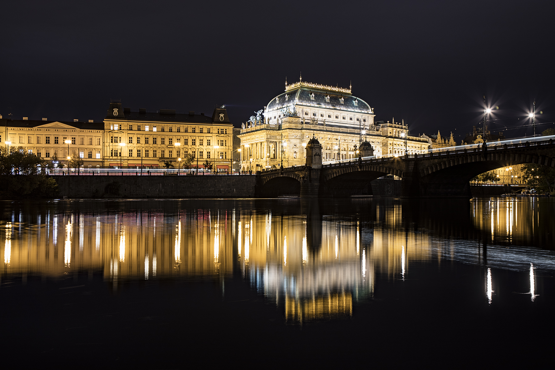 Prague National Theater and the Prague film school on the Vltava River.