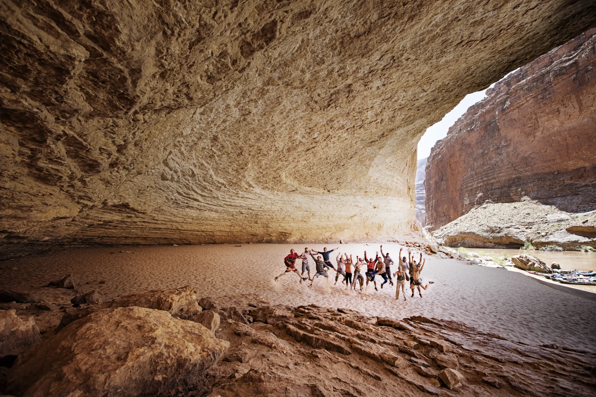 Group of 15 awesome people jumping for scale.