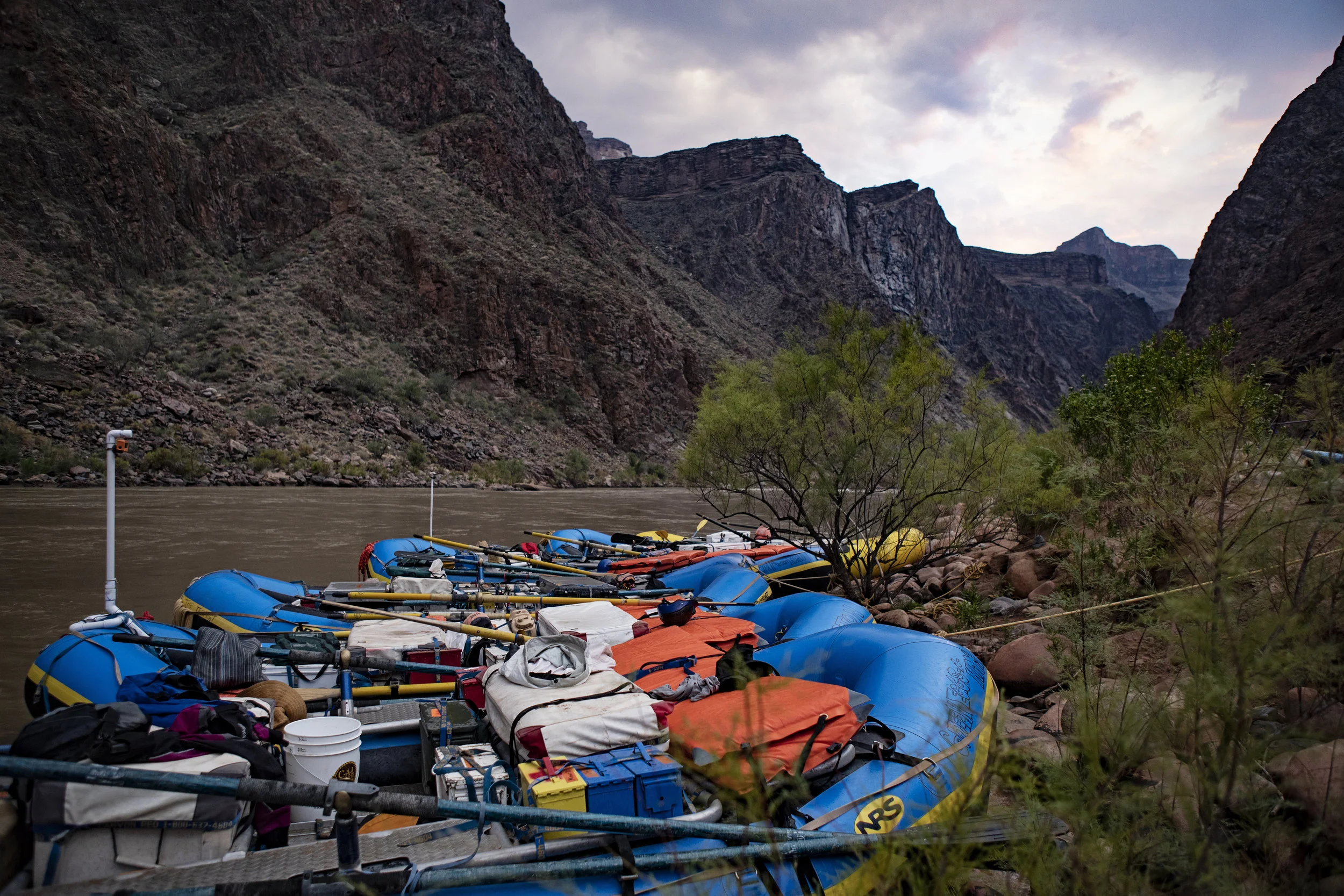 Boats in the eddy at camp, below pipe.