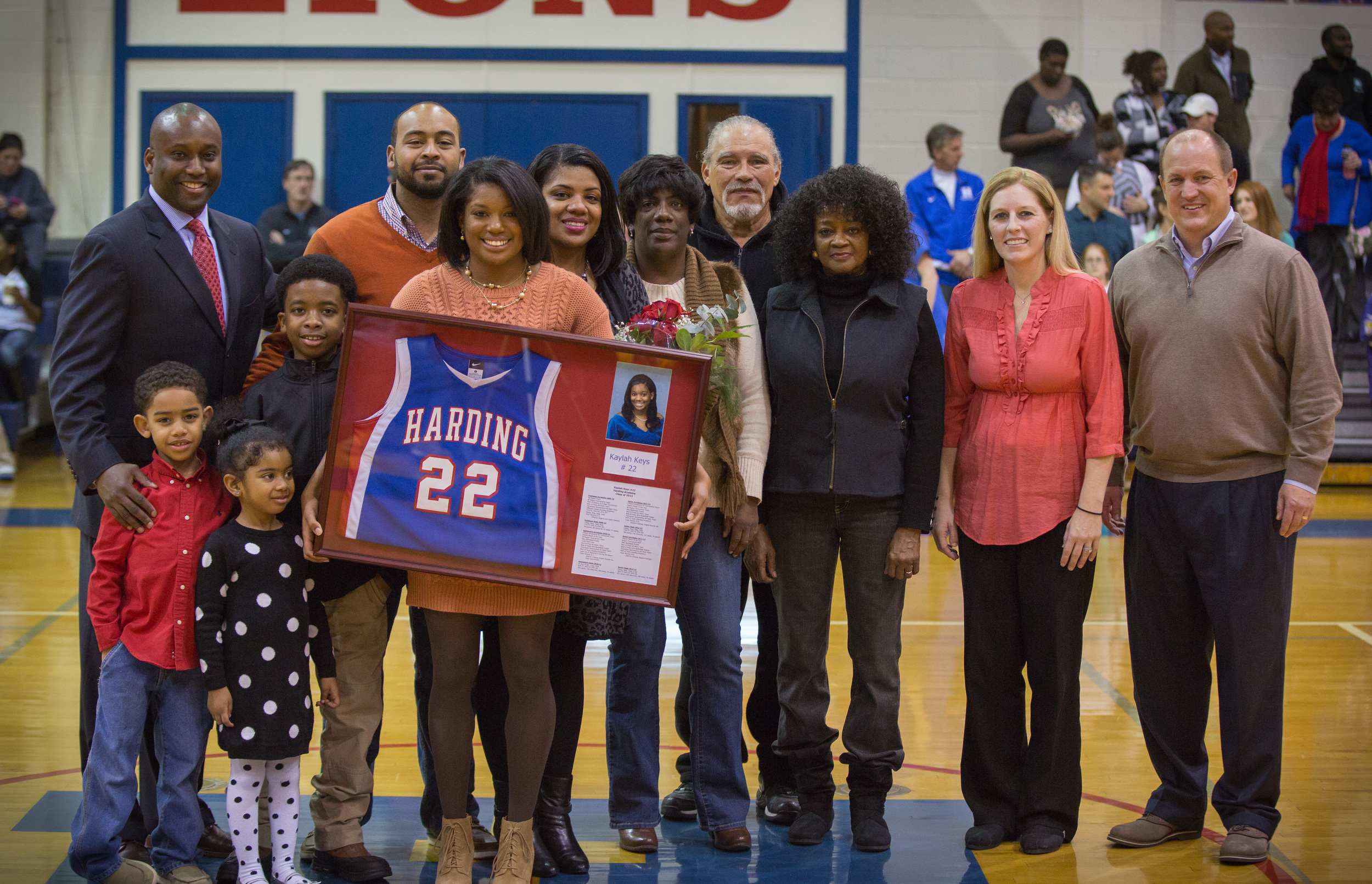 Retirement presentation at Harding Academy - Kaylah and her family, Coach Kevin Starks (far left) Coach Becky Starks (far right) and school president, Trent Williamson (far right).