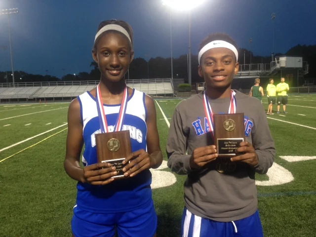 (L-R) LaNea Wallace and Austin Jackson won the Outstanding Performance Award at the Shelby 7/8 small school division championship track meet.