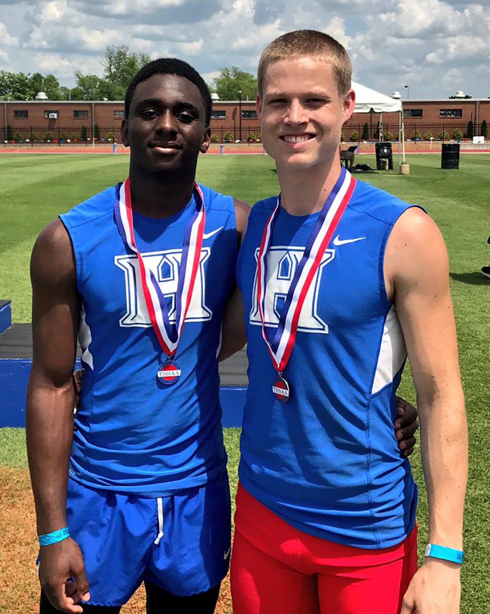 Ty Kimberlin is State Champion in triple jump. Coby Hollins is 2nd.