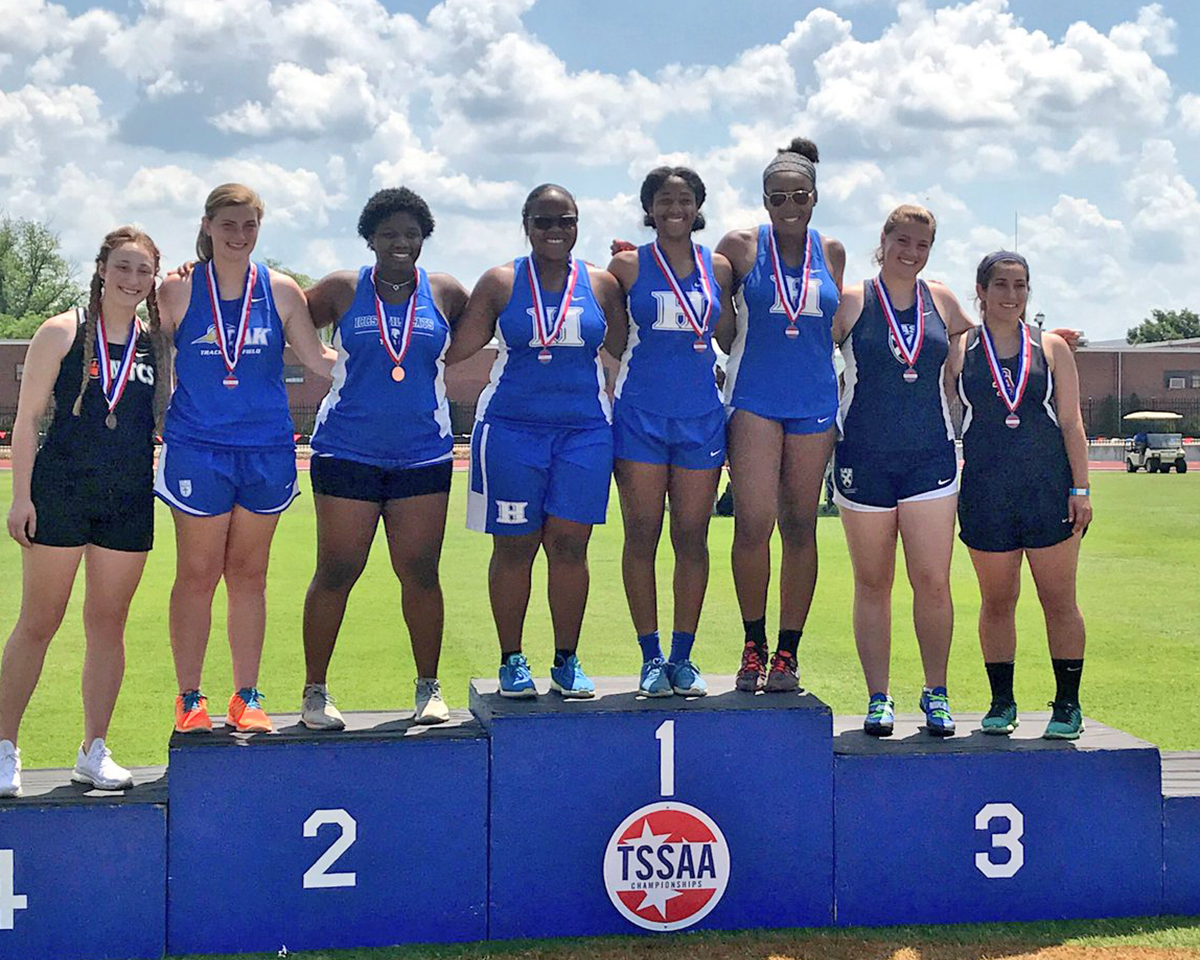 STATE CHAMPION in shot put! Hailey Smith is the State Champion, Jocelyn Bringht finishes 2nd, and Kimari Terrell finishes 3rd.