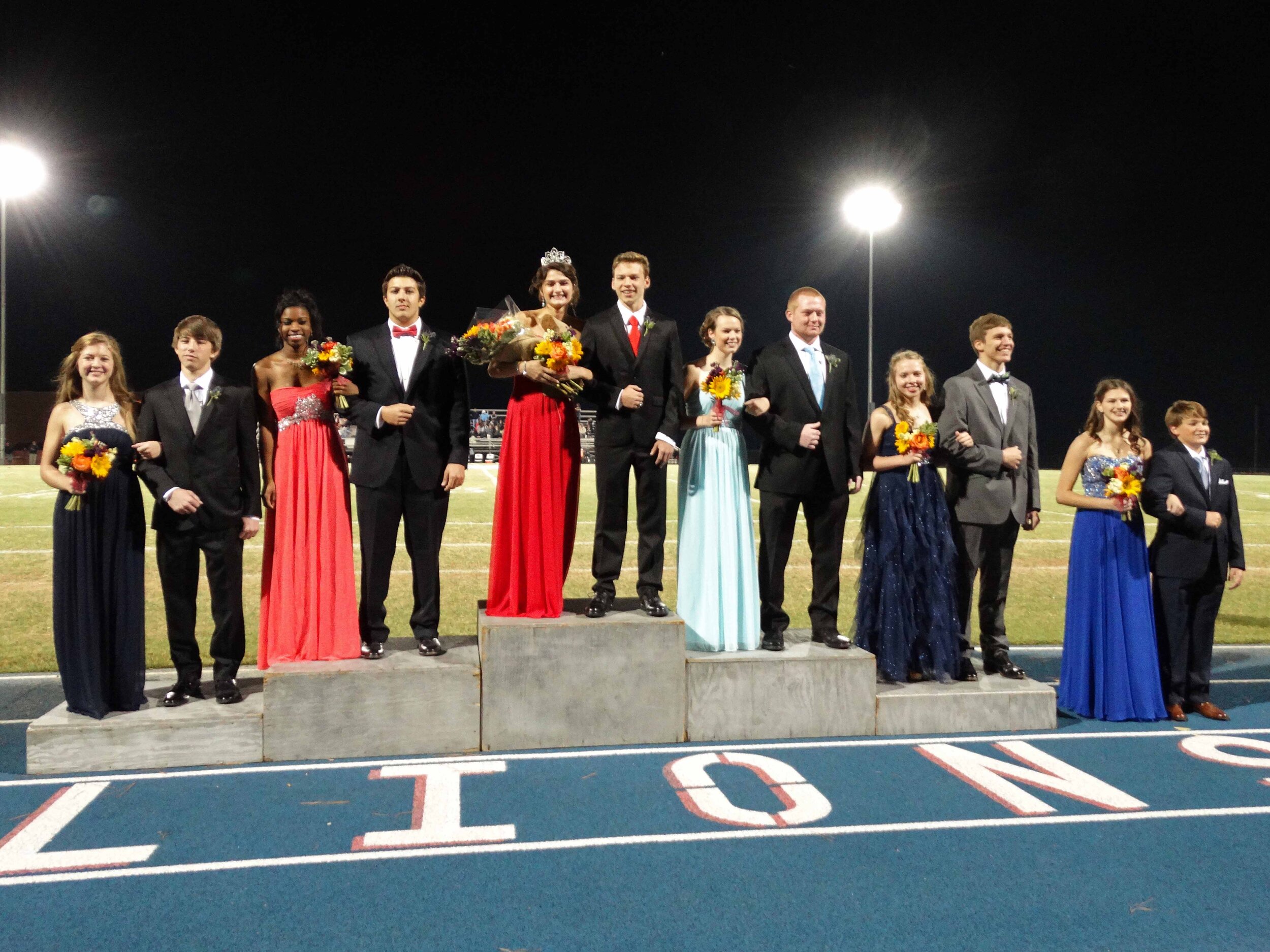 Pictured L-R: Macey Darnell with David Jackson; Kristen Gaines with Jonathan Mensi; Sara Jones (Queen) with Skylar Oliver; Kelsi Elkins with Nolan Stevens; Abigail Curtis with Caleb Knight; Lauren Deaton with Cole Williamson.