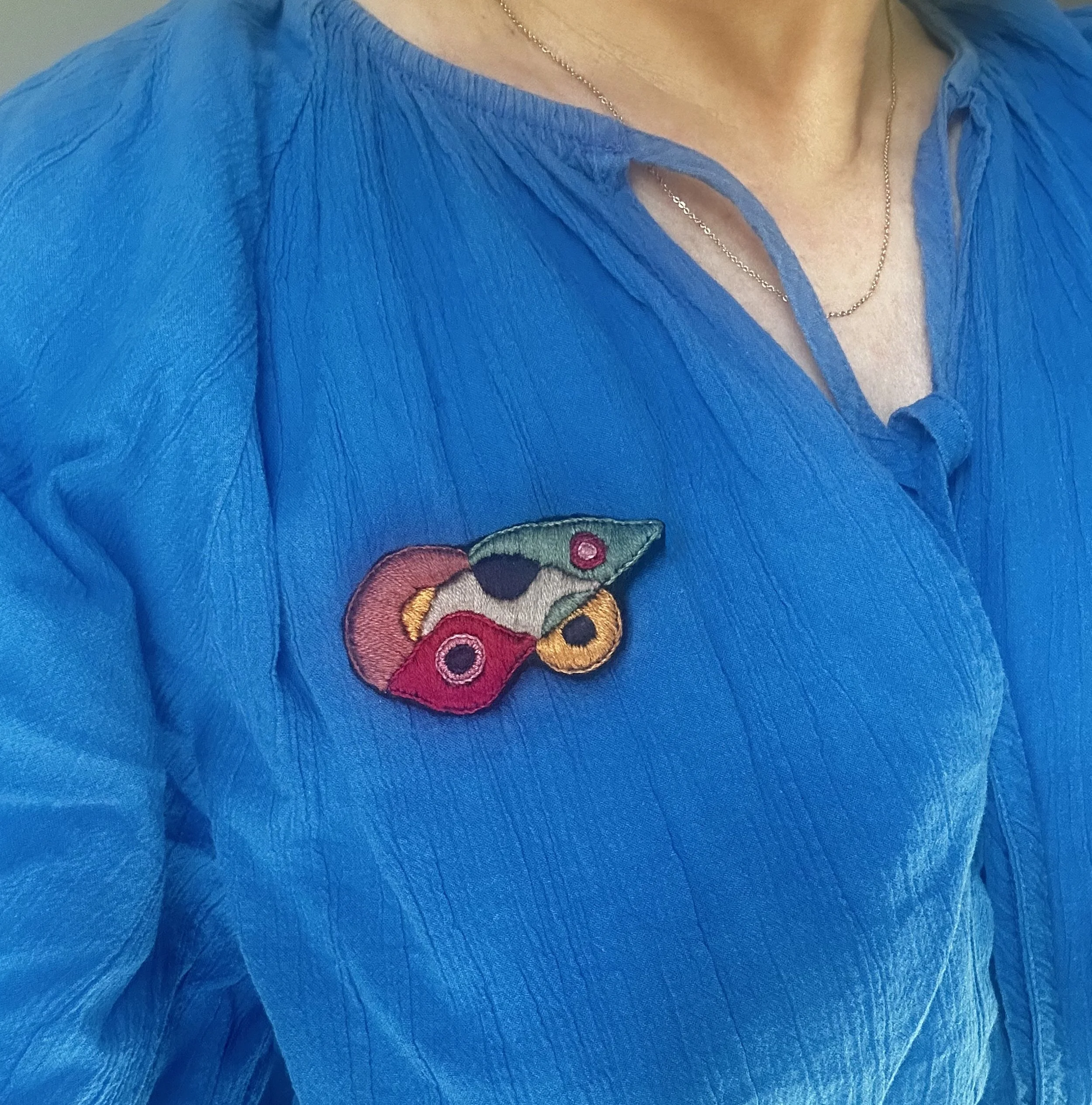 Sarah Pedlow Dadaist Eye brooch worn.jpeg