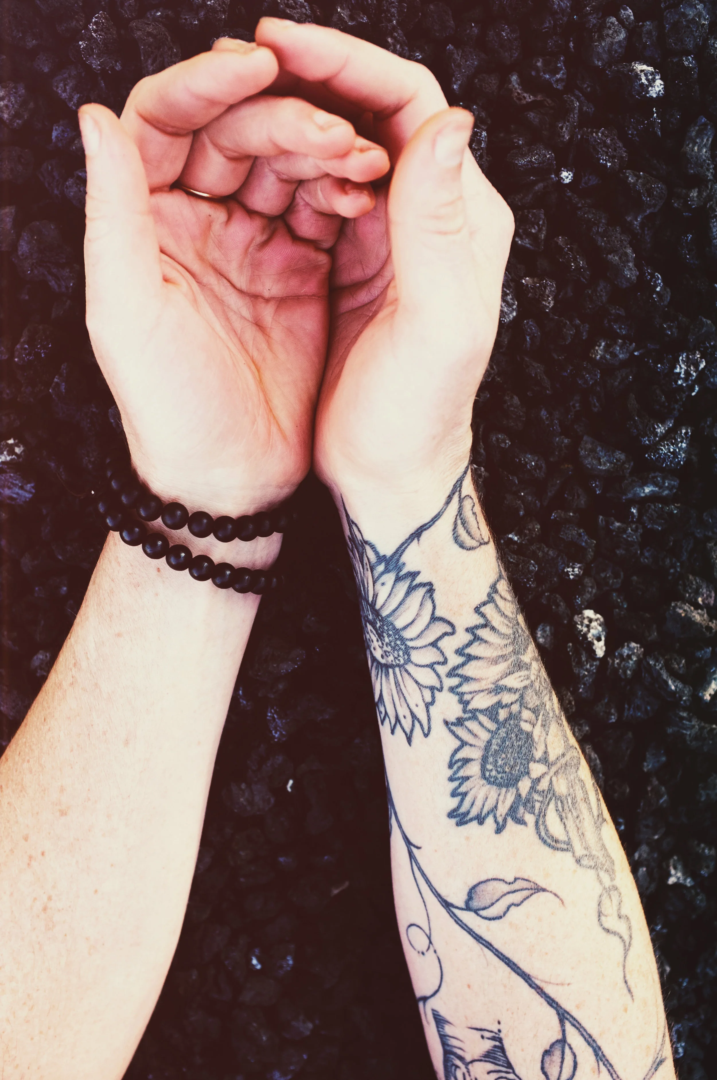 handsindarkrocks.jpg