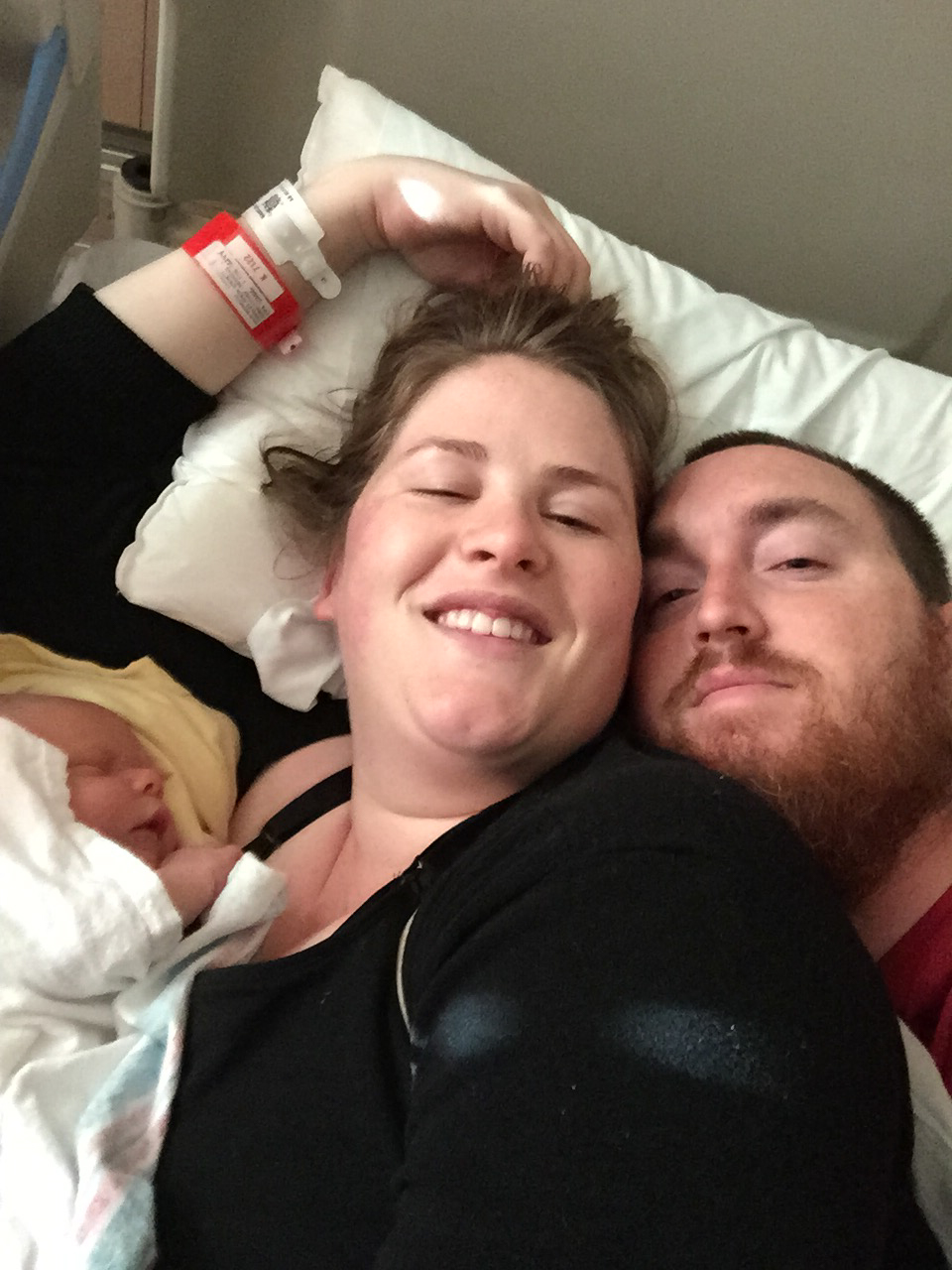 Our first family photo. I don't even care how swollen I am. This photo makes me deliriously happy. 