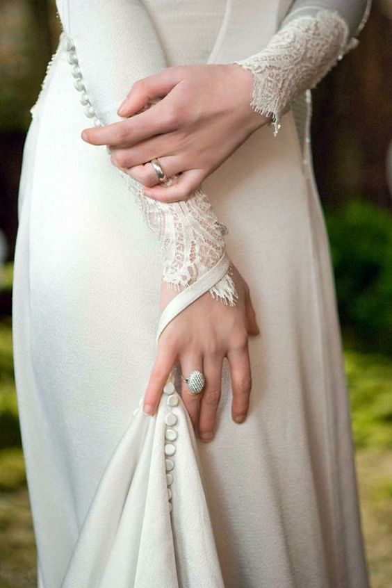 http://www.weddingpartyapp.com/blog/2012/11/20/wedding-dress-with-sleeves-lace-gown-bridal-sleeved-dresses/