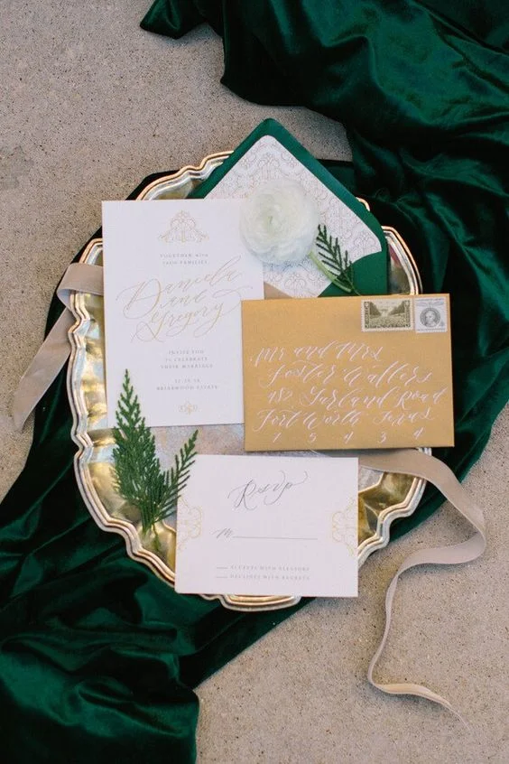 http://www.knotsvilla.com/elegant-emerald-gold-wedding-inspiration/